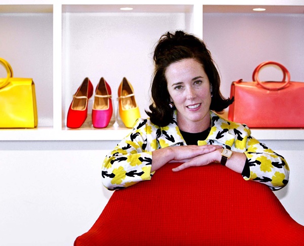 ** FOR USE WITH AP WEEKLY FEATURES **   Kate Spade pose with handbags and shoes from her next collection in New York, Thursday May 13, 2004.   (AP Photo/Bebeto Matthews)